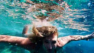 Hot milf dives into steamy underwater pool sex