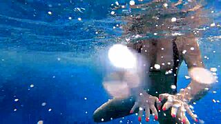 Hot milf dives into steamy underwater pool sex