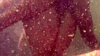 Hot milf dives into steamy underwater pool sex