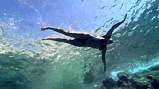 Hot milf dives into steamy underwater pool sex