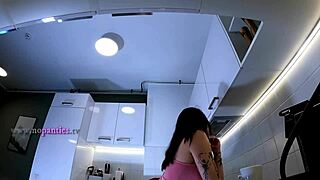 Hottest tattooed redhead cheerleader flashes see-through panties over-knee socks kitchen tease