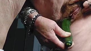 German Granny Oma Slams Thick Cucumber into Hairy Pussy.