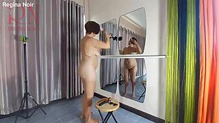 hey check out naked nudist hairdresser regina noir trimming her juicy shaved pussy lips at the beach dorm