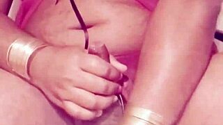 Shemale in sexy dress strokes seductively alone