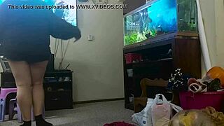 chubby mommy bends in shorts for house cleaning fun