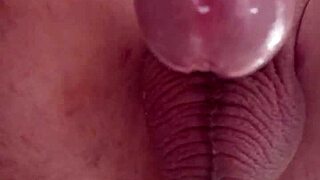 uncut tattooed cock erupts hands-free from brutal anal prolapse