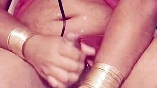 Shemale in sexy dress strokes seductively alone