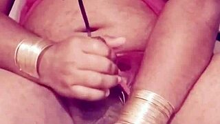 Shemale in sexy dress strokes seductively alone