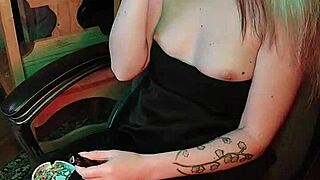 Mistress puffs cigarette slowly and sensually