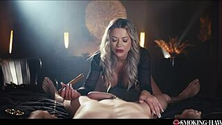 that horny milf strokes her huge tits while puffing a cigar and sucking cock