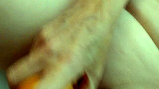 chubby housewife rams massive fat carrot deep into her wet pussy