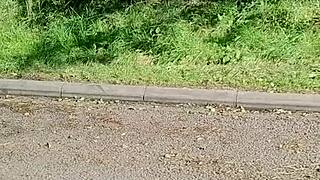 A horny housewife risks it all with a quick public car masturbation orgasm rub