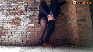 girl pegs boyfriend roughly in abandoned house outdoors