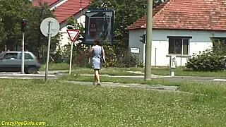 whoa 😲 redhead bbw milf unleashes golden shower peeing outdoors in public!