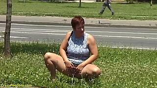 whoa 😲 redhead bbw milf unleashes golden shower peeing outdoors in public!