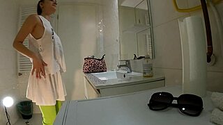 HORNY Brunette Coed Lifts Mini Skirt in Bathroom Revealing Panties Thong and Bare Pussy