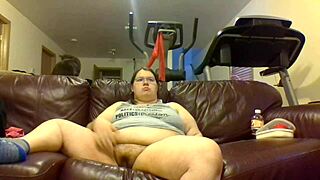 chubby girl pisses uncontrollably while watching tv feeling the warm relief spread