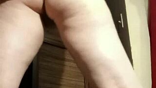 petite milf camgirl bends over fingering her ass for voyeur eyes