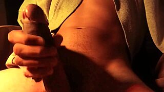 Naked dude strokes massive cock in sweater with loud bedroom pleasure moans