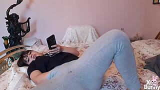 brunette latina fingers wet pussy watching phone porn closeup