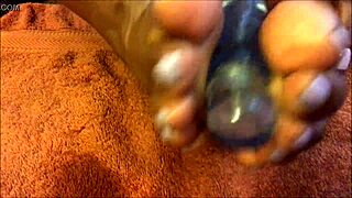 Sexfeene's oily feet glow under light-up dildo massage tease