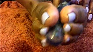 Sexfeene's oily feet glow under light-up dildo massage tease
