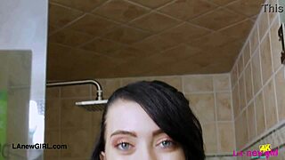 dark-haired darling steps into steamy shower