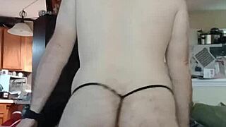 Chubby crossdresser shakes big ass in thong panties