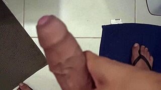 Husband's Steamy Bathroom Handjob Session Builds to Explosive Release