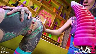 two tattooed lesbians gape asses with huge anal toys