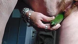 granny whore rams cucumber deep in her hairy german beaver