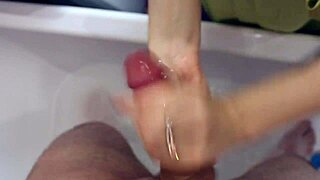 spying on stepmom in shower she washes jerks and sucks his cock then swallows before leaving