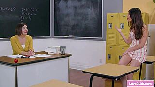 teacher's fingers tease young student's slick pussy in heated lesbian play
