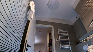 long-legged college girl alicia teases in plaid uniform miniskirt and stockings inside bathroom