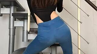 chinese babe dances sexy in tight jeans shaking ass curves music beats asian tight clothing tease