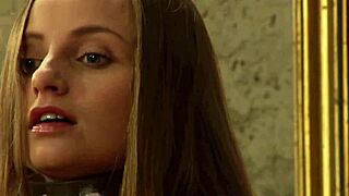 bound blonde sub takes strapon deep while fingering wildly