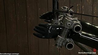 dyke bitch strapped tight in device gets flogged hard while choking gagging deepthroat!!!