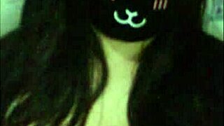 Goth cam girl shakes massive natural tits seductively for viewers