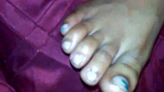 ebony babe strokes big cock with feet till cumshot sprays