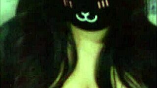 Goth cam girl shakes massive natural tits seductively for viewers
