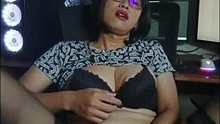 mitha sneaks a quick shemale cock stroke in her office