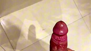 Wanna see this stud's monster cock erupt in the steamy shower?