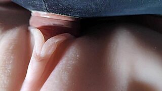 Double penetration fuck doll gets condoms stretched over hairless big pussy close-up double anal toys