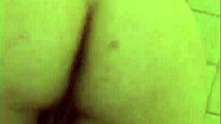 discover the allure of her wet pussy glistening in the hotel shower