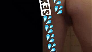 discover the allure of her wet pussy glistening in the hotel shower