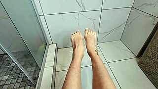 Sexy petite milf teases cock with bare feet toes footjob pov shower close up