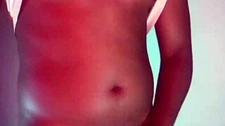 Redhead masturbates under hot room lights unleashing huge cumshot load