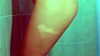 Hey, watch this college Brazilian beauty tease her wet thong pussy in steamy shower