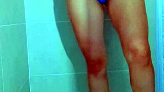 Hey, watch this college Brazilian beauty tease her wet thong pussy in steamy shower
