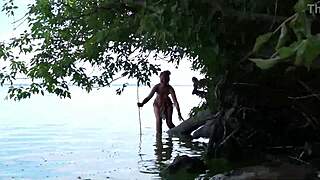 Topless mature babe fishes outdoors with massive harpoon in public homemade amateur exposure